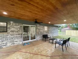 Huge covered patio, overlooking the massive backyard, with meditation garden near wood line.