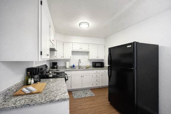 Bright updated kitchen with full-size appliances and ample counter space